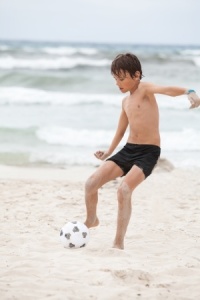 Boy playing soccer